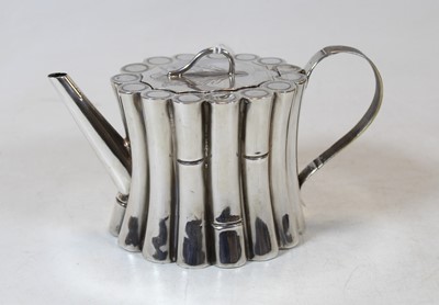 Lot 264 - A silver teapot in the form of standing bamboo...