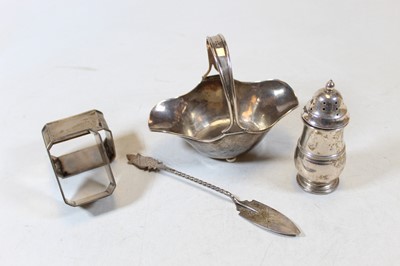 Lot 342 - A small George V silver basket, of shaped oval...
