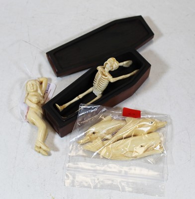 Lot 425 - A miniature model of a skeleton in mahogany...