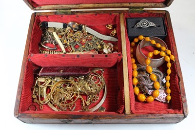 Lot 470 - A stained pine box and contents, to include...