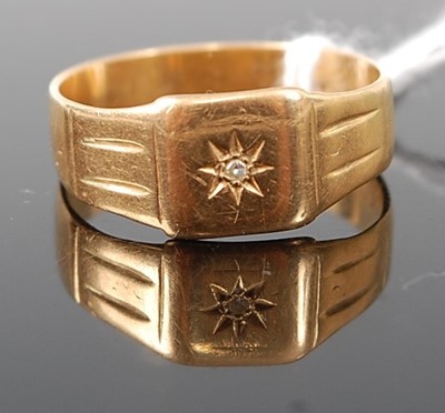 Lot 354 - A yellow metal gent's band ring, 'gypsy' set...