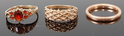 Lot 357 - A 9ct gold wedding band; together with a 9ct...