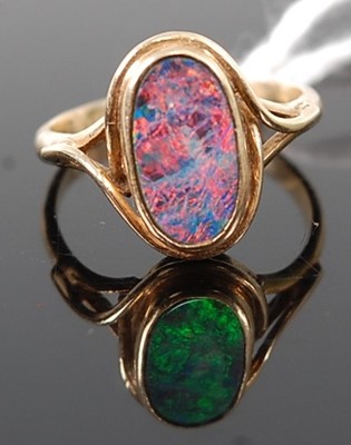 Lot 359 - A lady's yellow metal and *DOUBLET* opal set...