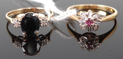 Lot 362 - A lady's yellow metal, ruby and diamond point...