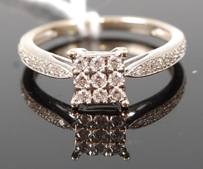 Lot 363 - A modern 9ct yellow and white gold diamond...