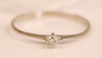 Lot 364 - A 9ct white gold diamond solitaire ring, the...