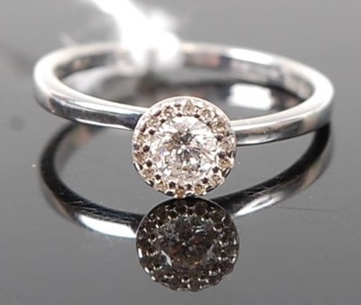 Lot 366 - A contemporary 9ct white gold diamond dress...