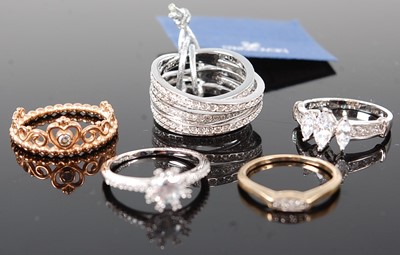 Lot 393 - A 9ct gold small diamond three stone ring,...