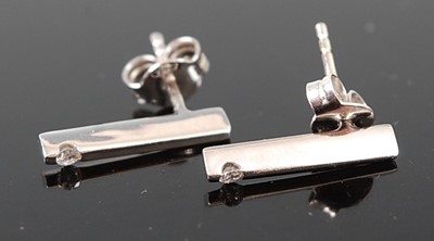 Lot 400 - A pair of contemporary 18ct white gold diamond...