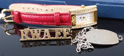 Lot 456 - A lady's quartz dress watch; together with a...