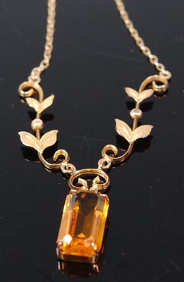 Lot 461 - A lady's yellow metal and paste set pendant on...