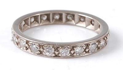 Lot 2674 - A white metal diamond full hoop eternity ring...