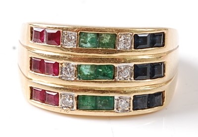 Lot 2675 - A yellow metal ruby, emerald, sapphire and...