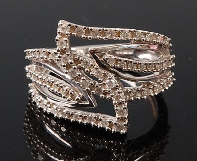 Lot 2678 - A 9ct white gold diamond three row crossover...