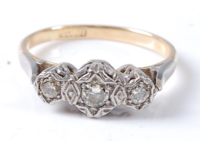 Lot 2693 - A yellow and white metal diamond three stone...