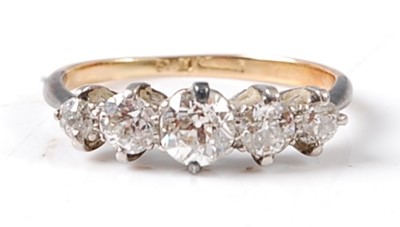 Lot 2699 - A yellow and white metal diamond five stone...