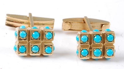 Lot 2713 - A pair of yellow metal turquoise cufflinks...