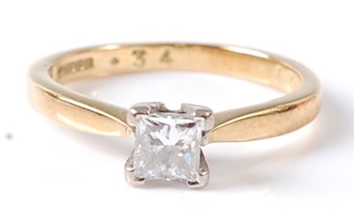 Lot 2739 - An 18ct yellow and white gold diamond single...