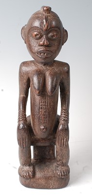 Lot 81 - * A seated ancestor figure, Baule People,...