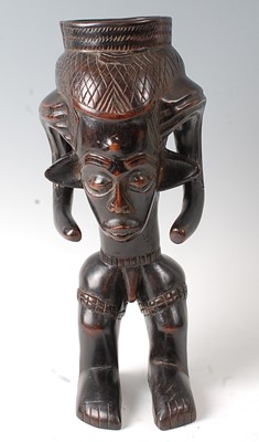 Lot 82 - * A zoomorphic standing palm wine cup, Kuba...