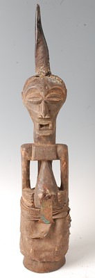 Lot 89 - * A male Power or fetish figure in standing...