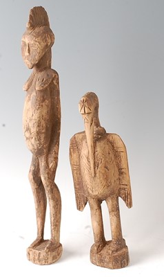 Lot 61 - * An ancestor figure, carved as a man in...