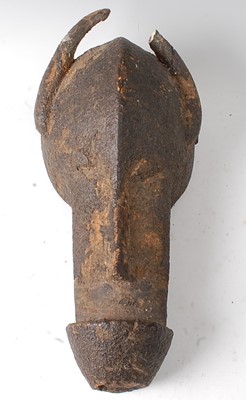 Lot 68 - * A zoomorphic helmet dance mask, encrusted in...