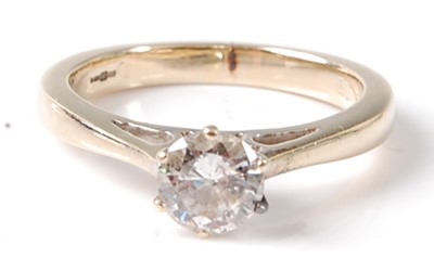 Lot 2786 - An 18ct yellow and white gold diamond single...