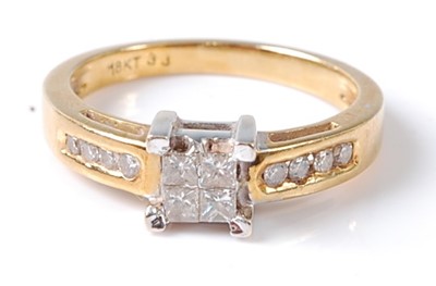 Lot 2796 - A yellow and white metal diamond cluster ring,...