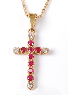 Lot 2797 - An 18ct yellow gold, ruby and diamond cross...