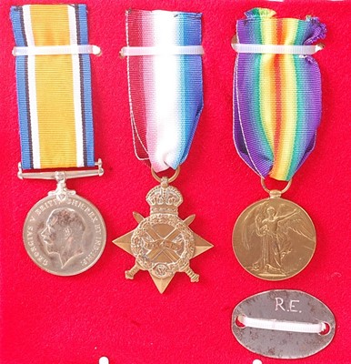 Lot 2103 - A WW I trio to include 1914-15 Star, British...