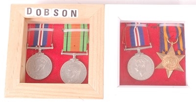 Lot 2106 - A WW II Defence and War pair with O.H.M.S. box...