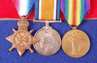 Lot 2112 - A WW I trio to include 1914-15 Star, naming...