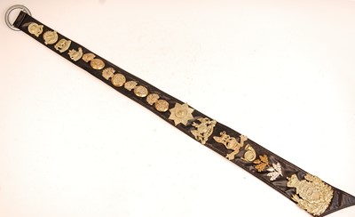 Lot 2187 - A collection of various headdress badges and...