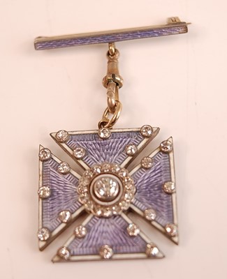 Lot 3088 - A yellow and white metal, diamond and enamel...