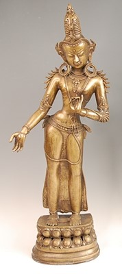 Lot 3229 - A probably Tibetan bronze figure of the...
