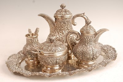 Lot 3226 - An Indonesian Yogya white metal four-piece...