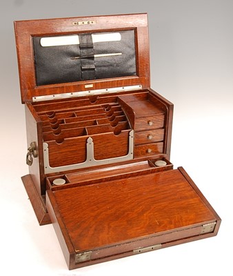 Lot 3187 - A late Victorian oak fitted stationery box by...