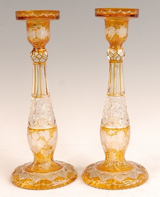 Lot 3043 - A pair of Bohemian cut and amber flash glass...