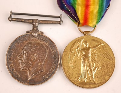 Lot 2159 - A WW I British War and Victory pair, naming...