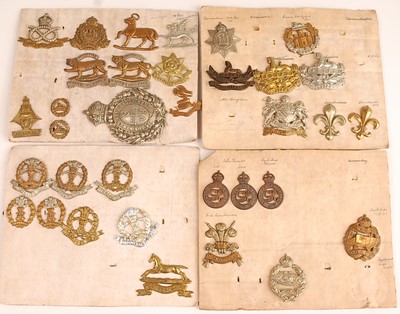 Lot 2212 - A collection of cap badges, glengarry badges...