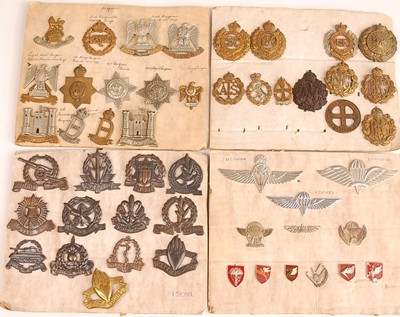Lot 2217 - A collection of cap badges, lapel badges and...