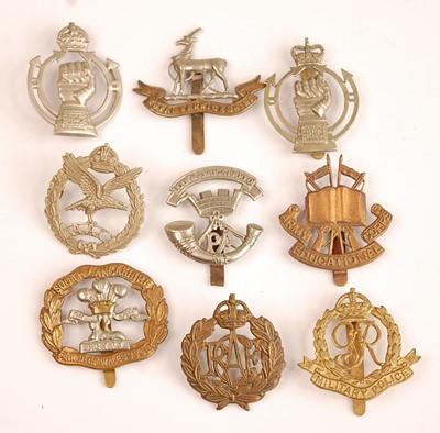 Lot 2218 - A collection of cap badges, buttons and...