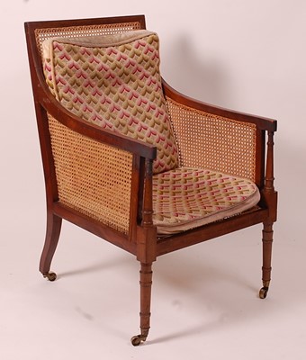 Lot 3376 - A 19th century mahogany Bergere library chair,...
