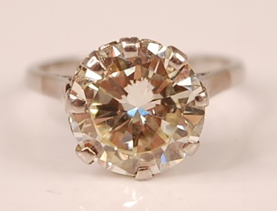 Lot 3100 - A platinum diamond solitaire ring, featuring a...