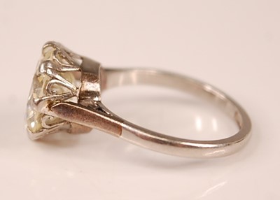 Lot 3100 - A platinum diamond solitaire ring, featuring a...