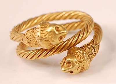 Lot 3114 - A yellow metal Etruscan style twisted...