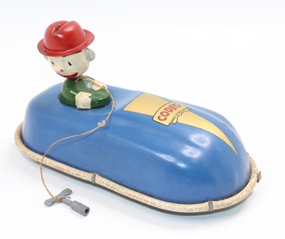 Lot 1903 - A Codeg of England tinplate and clockwork...