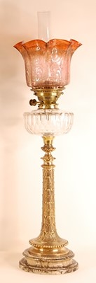 Lot 3208 - A late Victorian pedestal oil lamp, having a...