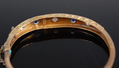 Lot 3082 - A late Victorian yellow metal, sapphire and...